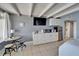 Inviting living space featuring a kitchenette, dining area, and stylish decor at 611 Destiny Dr # 205, Ruskin, FL 33570
