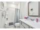 Bathroom featuring neutral decor, single vanity, and shower and tub combo at 6374 Bradford Woods Dr, Zephyrhills, FL 33542