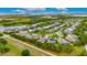 A residential neighborhood boasting lakes, lush trees, and beautiful homes near a body of water at 6611 Current Dr, Apollo Beach, FL 33572
