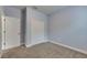 Bedroom with neutral wall-to-wall carpet and closet at 6611 Current Dr, Apollo Beach, FL 33572