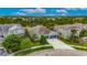 Beautiful two-story home boasting a well-manicured lawn and a spacious three-car garage at 6611 Current Dr, Apollo Beach, FL 33572