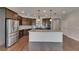Modern kitchen with stainless steel appliances and large center island, great for entertaining at 6611 Current Dr, Apollo Beach, FL 33572