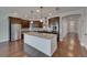 Beautiful kitchen with stainless steel appliances, granite island, and ample storage at 6611 Current Dr, Apollo Beach, FL 33572