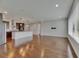 Open kitchen and living room layout with hardwood floors and natural light at 6611 Current Dr, Apollo Beach, FL 33572