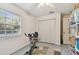 Bedroom with natural lighting, tiled flooring, ceiling fan and a spacious closet at 711 6Th Ne St, Largo, FL 33770