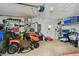Spacious garage featuring shelving and storage for tools and equipment at 711 6Th Ne St, Largo, FL 33770