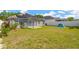 Spacious backyard with pergola, solar panels, privacy fence and room to play at 7705 Dragon Fly Loop, Gibsonton, FL 33534