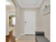 Welcoming entryway with neutral colors, tile flooring, and access to the living areas at 7705 Dragon Fly Loop, Gibsonton, FL 33534