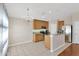 Lovely kitchen showcasing stainless steel appliances, light cabinets, and tile floors at 7705 Dragon Fly Loop, Gibsonton, FL 33534