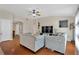 Cozy living room with hardwood floors, stylish furniture, and plenty of natural light at 7705 Dragon Fly Loop, Gibsonton, FL 33534