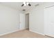 Neutral paint colors in a bedroom featuring carpet at 7939 Merchantville Cir, Zephyrhills, FL 33540