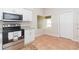 The kitchen features stainless steel appliances and granite counters at 7939 Merchantville Cir, Zephyrhills, FL 33540