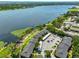Stunning aerial view of the community, showcasing its lakeside location and convenient parking areas at 10100 Sailwinds N Blvd # 203, Largo, FL 33773