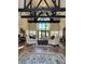 Clubhouse interior boasting high ceilings, exposed beams, natural light, and comfortable seating at 10100 Sailwinds N Blvd # 203, Largo, FL 33773