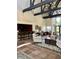 Spacious clubhouse interior features a bar, seating, tile floors, and ample lighting at 10100 Sailwinds N Blvd # 203, Largo, FL 33773