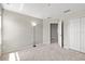 A serene bedroom with ample natural light and a spacious closet for storage at 10712 Pleasant Knoll Dr, Tampa, FL 33647