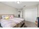 Comfortable bedroom with closet and carpet floors at 10712 Pleasant Knoll Dr, Tampa, FL 33647