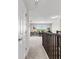 Bright upstairs hallway with a work area and natural light, offering a versatile space at 10712 Pleasant Knoll Dr, Tampa, FL 33647