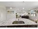 Modern kitchen featuring granite countertops, and seamless flow to living spaces at 10712 Pleasant Knoll Dr, Tampa, FL 33647