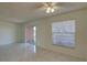Bright and airy living room with sliding glass doors and window views at 1095 82Nd N Ter # 1095A, St Petersburg, FL 33702