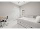 Bright bedroom features a pull-out trundle bed, work space, and a large closet at 11014 Rustic Timber Loop, San Antonio, FL 33576