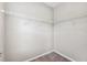 Walk-in closet features carpet flooring and wire shelving at 1103 Coral Ln, Dunedin, FL 34698