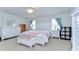 Large bedroom with white furniture, a white bed, and ample natural light at 11231 Spring Point Cir, Riverview, FL 33579
