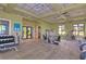 Well-lit community gym with modern exercise equipment and ample space for various workout activities at 11231 Spring Point Cir, Riverview, FL 33579