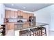 Spacious kitchen with stainless appliances, island with seating, and ample cabinet space at 11231 Spring Point Cir, Riverview, FL 33579