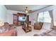 Cozy living room with a ceiling fan, media center, and comfortable seating at 11231 Spring Point Cir, Riverview, FL 33579