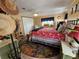 Bright bedroom with ceiling fan, closet, and cozy decorations make this a calming retreat at 121 Dolphin S Dr, Oldsmar, FL 34677