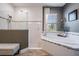 Relaxing bathroom with a soaking tub, glass shower, and natural light at 13121 Pasture View Loop, Riverview, FL 33579