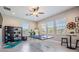 Spacious bonus room featuring multiple windows, recessed lighting and a ping pong table at 13121 Pasture View Loop, Riverview, FL 33579