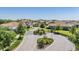 Upscale gated community entrance with lush landscaping and well-maintained roadways at 13121 Pasture View Loop, Riverview, FL 33579