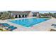 Large community pool provides many opportunities to swim laps; pool house in background at 13121 Pasture View Loop, Riverview, FL 33579