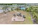 Aerial view of the community playground with modern equipment and ample space at 13121 Pasture View Loop, Riverview, FL 33579