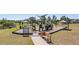 Community playground with multiple slides and play areas at 13121 Pasture View Loop, Riverview, FL 33579