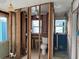 Bathroom renovation with exposed framing, plumbing, and a toilet, creating a blank canvas for your design ideas at 13200 Boca Ciega Ave, Madeira Beach, FL 33708