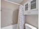 Neutral toned bathroom with a shower-tub combo and a matching toilet and sink combo at 13308 Kearney Way, Tampa, FL 33626