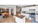 This kitchen features a center island, stainless steel appliances, and hardwood floors at 13308 Kearney Way, Tampa, FL 33626