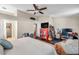 Spacious primary bedroom has vaulted ceilings, a work space, and a decorative dresser at 13308 Kearney Way, Tampa, FL 33626