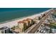 Aerial view showing building and surrounding neighborhood at 13600 Gulf Blvd # 700A, St Petersburg, FL 33708