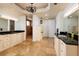 Bright bathroom with dual vanities, granite countertops, and a luxurious tiled shower at 13600 Gulf Blvd # 700A, St Petersburg, FL 33708