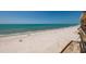 Expansive beach view from the property, showing the beach, water and the horizon at 13600 Gulf Blvd # 700A, St Petersburg, FL 33708