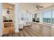 Bedroom boasts water view, wood floors and an en suite bath, exuding comfort at 13600 Gulf Blvd # 700A, St Petersburg, FL 33708