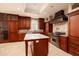 Spacious kitchen features custom cabinets, a center island, and professional-grade Wolf appliances at 13600 Gulf Blvd # 700A, St Petersburg, FL 33708