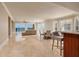 Large living room with beach views and seating area at 13600 Gulf Blvd # 700A, St Petersburg, FL 33708