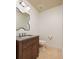 Powder room with vanity and toilet at 13600 Gulf Blvd # 700A, St Petersburg, FL 33708