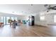 Spacious living room area with tile floor, a ceiling fan, and lots of natural light at 1419 47Th Ne Ave, St Petersburg, FL 33703