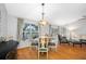 Inviting dining area offering a view of the pool and backyard, perfect for entertaining guests at 1610 Navigator Ln, Tarpon Springs, FL 34689